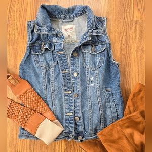 Distressed denim vest